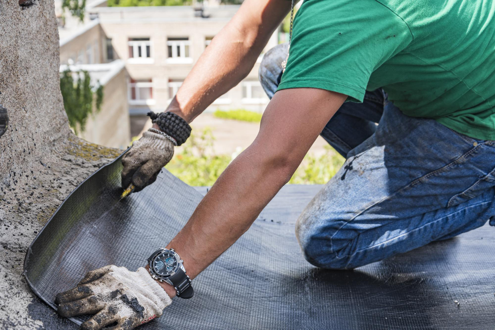 putting shingles on a roof